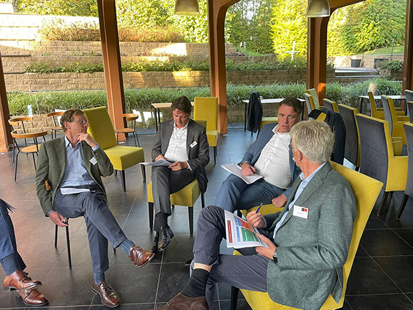 JBR Interim Executives Roundtable on WHOA five men in conversation in suits